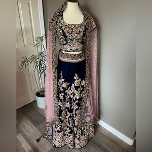Navy Blue Velvet lehenga with hand embroidery and light pink accents